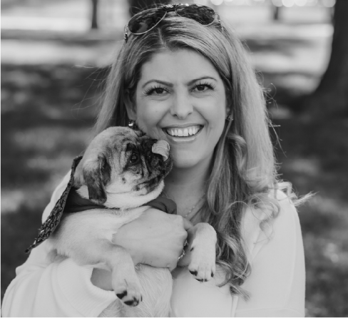 black and white photo of lindsay with dog